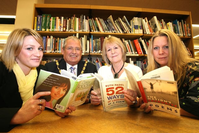 Derbyshire County Council chairman Robin Baldry welcomes new poet laureate Ann Atkinson, centre, with help from Kerrie Gosney, left, and Ann’s daughter Rosie Dymond, right in 2009