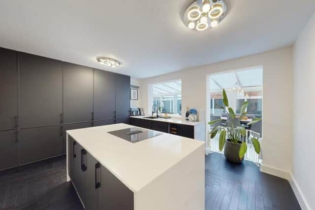 A stylish kitchen with central island.