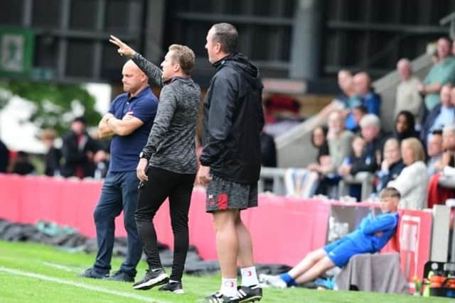 Doncaster Rovers boss Gary McSheffrey dishes out instructions against FC United of Manchester. Photo: Howard Roe/AHPIX LTD.