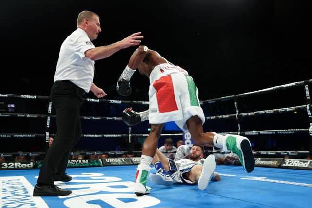 Zolani Tete knocks out Jason Cunningham during their IBF International and Commonwealth super-bantamweight title fight in July (photo by James Chance/Getty Images).