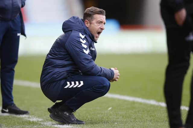 Northampton Town manager Jon Brady.