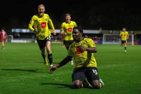 Huddersfield loanee Jaheim Headley celebrates scoring for Harrogate.