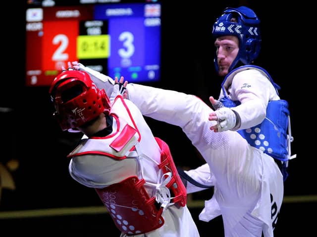 Aiming high: Bradly Sinden, right, is a two-time world champion and an Olympic silver medallist but he wants more in Manchester this weekend and Paris next summer. (Picture: ULISES RUIZ/AFP via Getty Images)