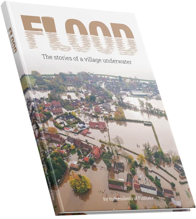Residents of Fishlake produced a book documenting the flood which devastated their community. Pic by mockups-design.com