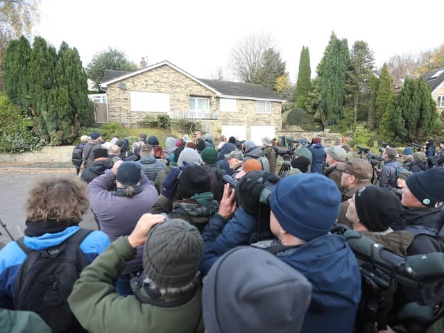Dozens of birdwatchers flock to a quiet cul-de-sac in Shelf, near Halifax, after a rare bird was sighted perched on a garden washing line.