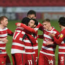 Taylor Richards is congratulated on his goal against Oxford. Picture: Howard Roe/AHPIX