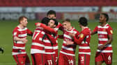 Taylor Richards is congratulated on his goal against Oxford. Picture: Howard Roe/AHPIX