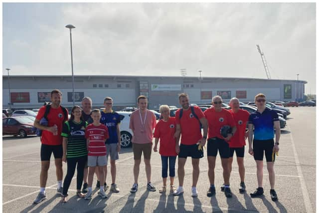 Ex-Doncaster Rovers star Tommy Spurr dropped into his old club on a charity bike ride in aid of his son Rio, who is battling cancer.