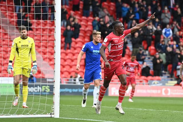 Joe Dodoo celebrates putting Rovers ahead. Picture: Howard Roe/AHPIX