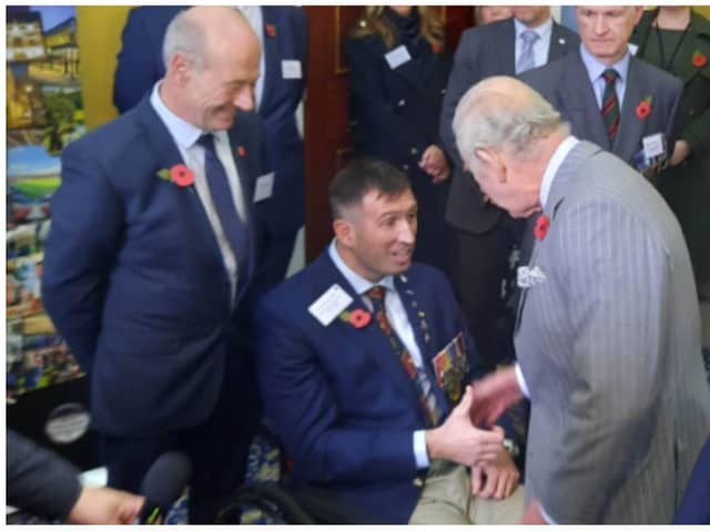 King Charles meets Ben Parkinson at the Mansion House.