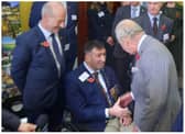 King Charles meets Ben Parkinson at the Mansion House.