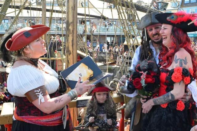 The pair tied the knot on a ship in Brixham. (Photo: SWNS).