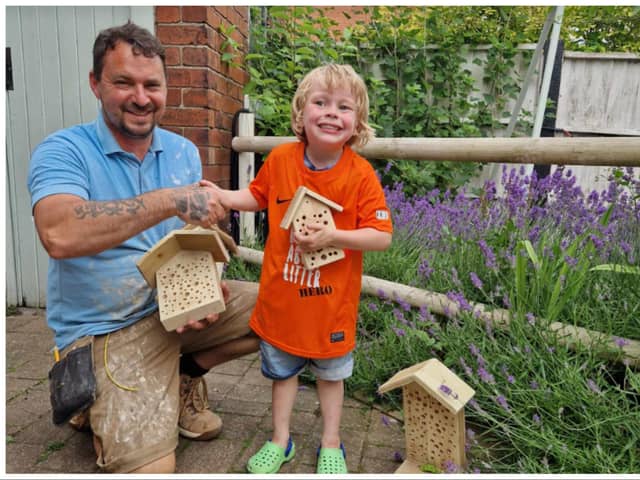 Paul Cook surprised Logan with some freshly made bug houses.