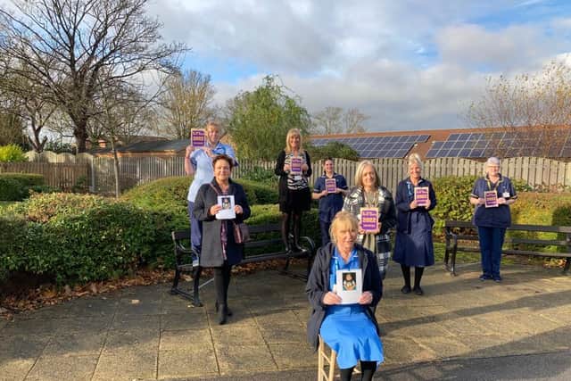 Thirteen nurses, nursing assistants and admin staff at the RDASH Tickhill Road site at Balby feature on the Twit Twoo calendar. Here they are keeping it under wraps.
To see them in all their glamorous glory you will have to buy a calendar.