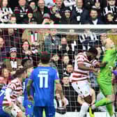 Jonathan Mitchell punches the ball clear against Grimsby.
