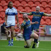 Liam Johnson celebrates his late try. Photo: Rob Terrace