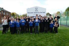 Pupils and staff at Doncaster School for the Deaf signing ‘Good’.