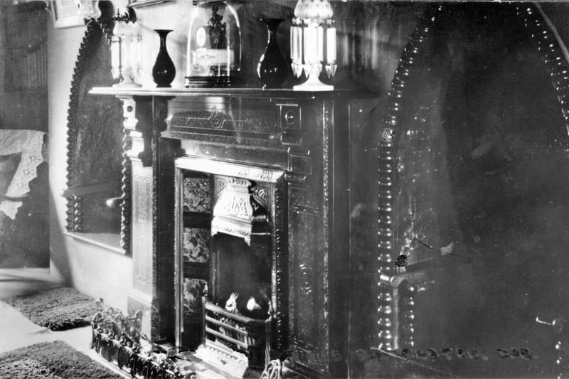 The fireplace in the Sand House's drawing-room, known as the Long Room.