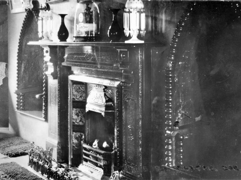 The fireplace in the Sand House's drawing-room, known as the Long Room.