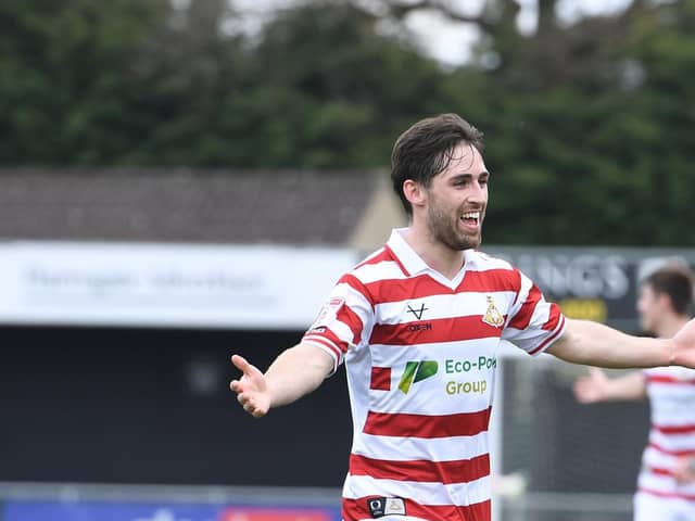 Aidan Barlow celebrates opening the scoring against Harrogate Town for Doncaster Rovers. Picture: Howard Roe/AHPIX LTD
