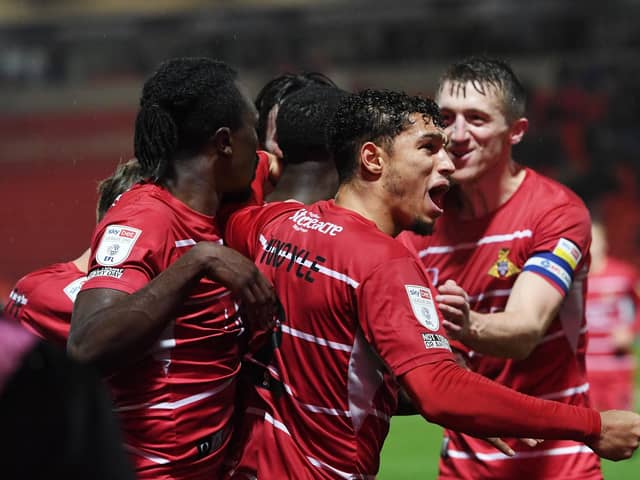 Rovers celebrate after Joseph Olowu's winner against Shrewsbury Town