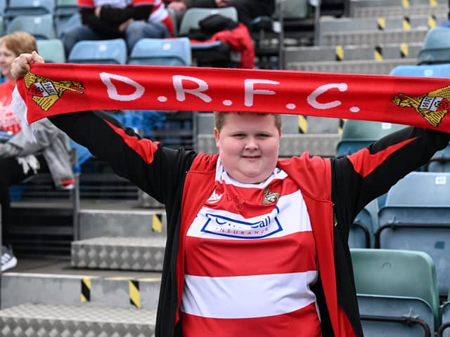 Doncaster Rovers were backed by a big away following as they officially sealed a play-off place.