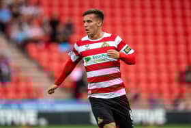 HIGH DEMANDS: Doncaster Rovers midfielder George Broadbent is delighted with his manager's attitude