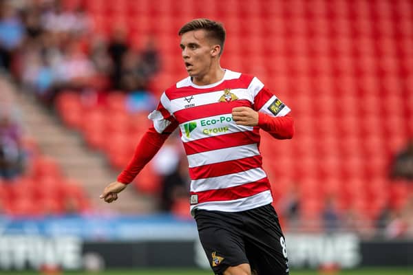 HIGH DEMANDS: Doncaster Rovers midfielder George Broadbent is delighted with his manager's attitude