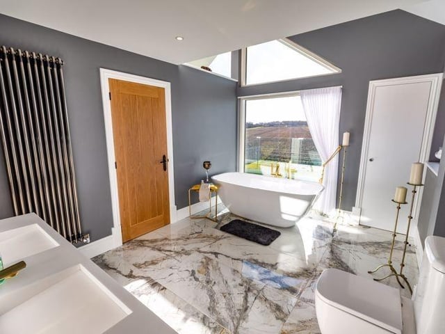 One of the five contemporary bathrooms within the property.