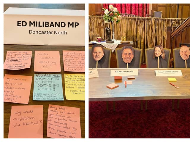 Doncaster's MPs were shamed with their faces on sticks at a winter fuel payment protest.