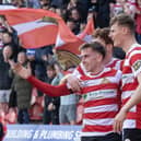 Joe Sbarra celebrates his goal with fellow scorer Rob Street. Pic: Tony Johnson.