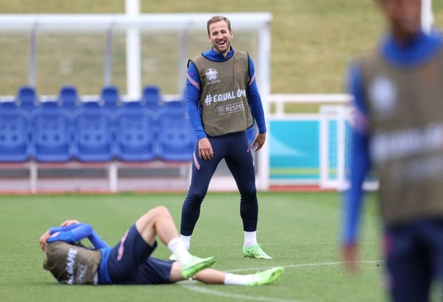 Harry Kane is all smiles during training. Photo by Catherine Ivill/Getty Images