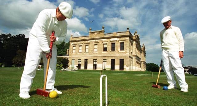 The croquet club on the lawn in 1997.