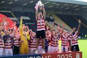 Richard Wood sealed a fifth promotion in his final season as a player.