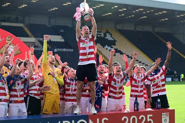 Richard Wood sealed a fifth promotion in his final season as a player.