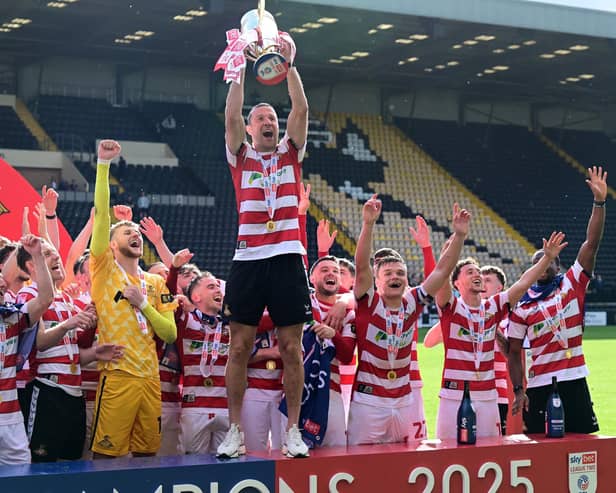 Richard Wood sealed a fifth promotion in his final season as a player.