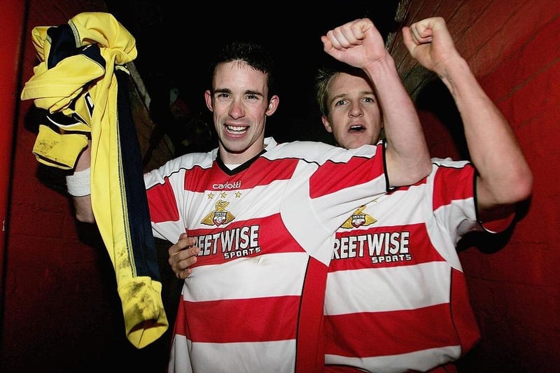 Michael McIndoe and James Coppinger celebrate in the tunnel at the end of the Carling Cup match between Doncaster Rovers and Aston Villa at Belle Vue Stadium on November 29, 2005.