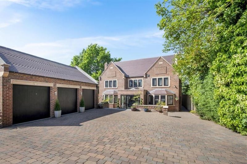 The front aspect of the Doncaster property with triple garage.