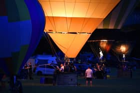 Hot air balloons light up Town Fields on the first day of Doncaster Balloon Festival. (Photo: Luc Burke-Lejeune).