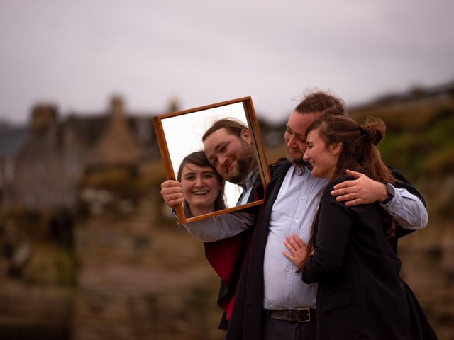 At the West Sands rocks
Forrest Pando (from Charlottesville USA, graduating with an MLitt in Film Studies) and his wife (an Undergrad student at St Andrews) Zaynah
As a marker of this unique and challenging period, we wanted to celebrate the essence of the St Andrews graduate during these unprecedented times. By recording their thoughts on life in 'the bubble' and beyond, we hoped, in a small way, to capture the spirit of our Saints of 2020. In a collaboration with graduating English Masters student Sophia Eve Rink, who came up with the theme of Reflections, we invited seven students still in the area to take part in a socially distanced outdoors photoshoot, in a location that was important to them.