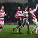 Doncaster's James Maxwell celebrates his goal.