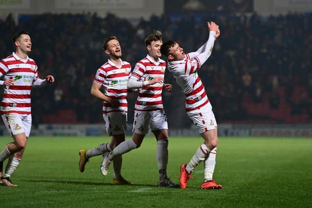 Doncaster's James Maxwell celebrates his goal.