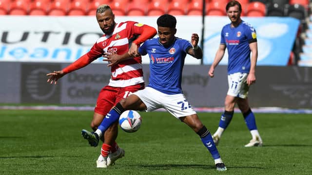 John Bostock battles with Charlton goalscorer Ian Maatsen. Photo: Andrew Roe