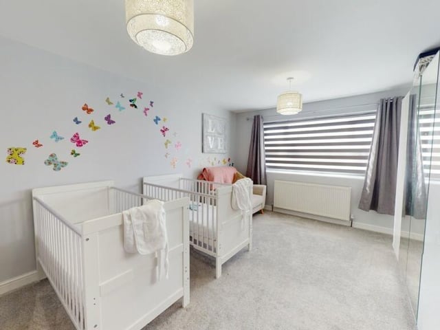 Another of the spacious bedrooms within the house.