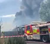 Firefighters are battling to extinguish the blaze at the derelict building on Gattison Lane, New Rossington. Pictures and video courtesy of Beth-Louise Jeeves