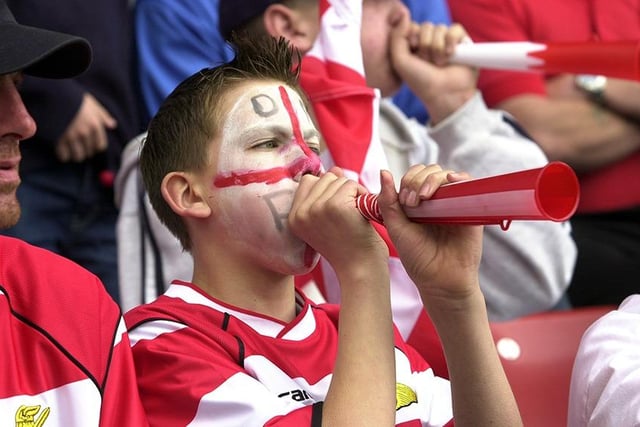 A young Rovers fan gets behind his team, May 10, 2003