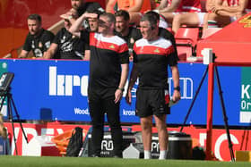 Doncaster Rovers manager Grant McCann with his assistant Cliff Byrne.