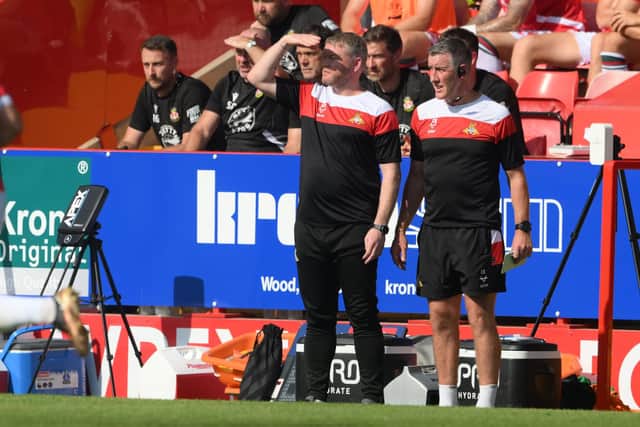 Doncaster Rovers manager Grant McCann with his assistant Cliff Byrne.