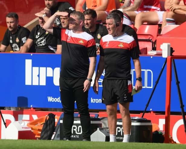 Doncaster Rovers manager Grant McCann with his assistant Cliff Byrne.