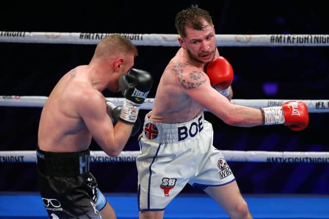 Maxi Hughes throws a shot at Paul Hyland Jnr. Photo: Alex Livesey/Getty Images